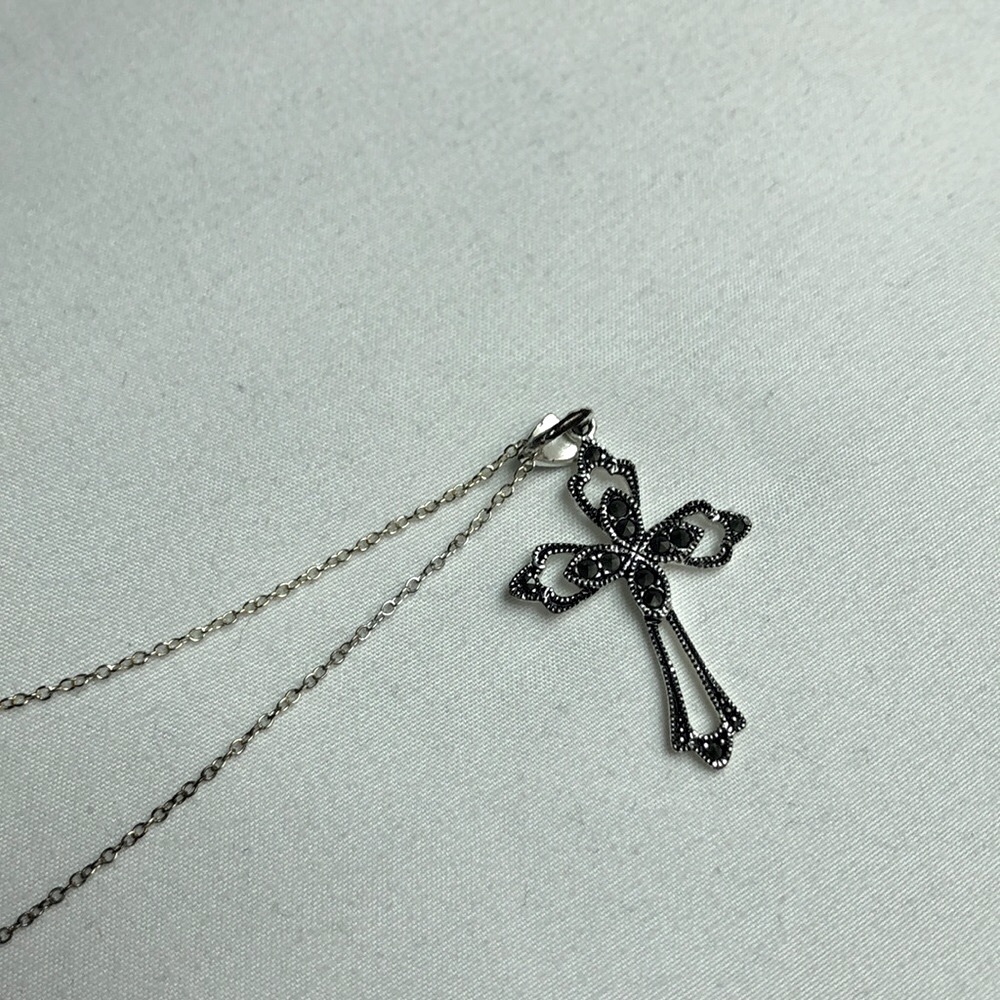 Sterling silver cross necklace.